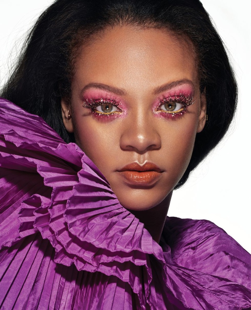 Wearing a glittery eye make look, Rihanna poses in Valentino Haute Couture dress