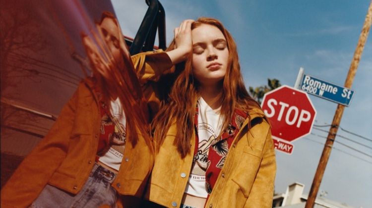 Sadie Sink rocks fringed jacket, graphic tee and denim shorts from Pull & Bear collaboration