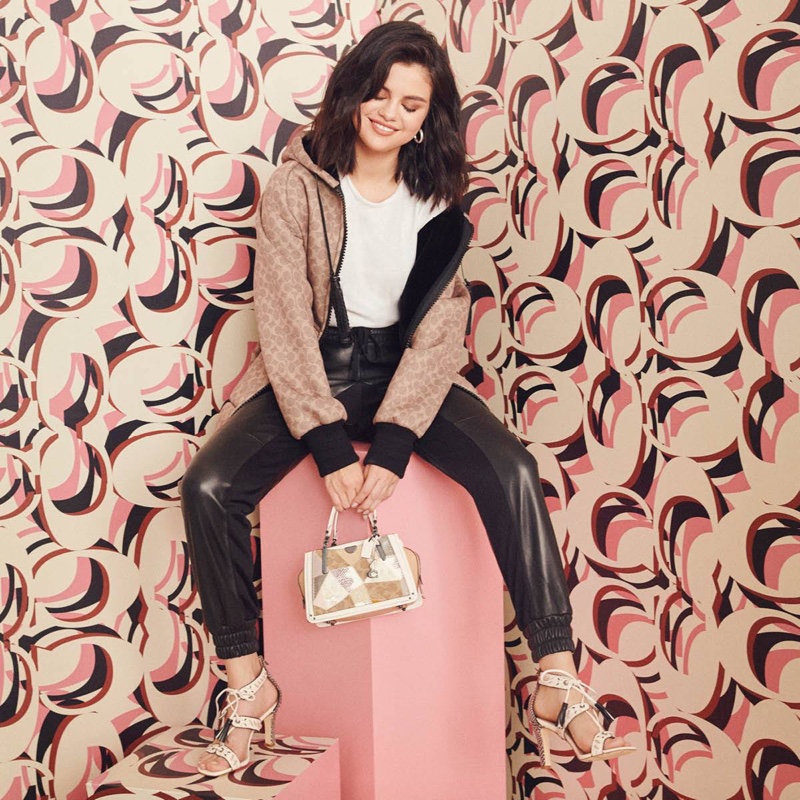 Singer Selena Gomez models the Dreamer 21 bag from Coach