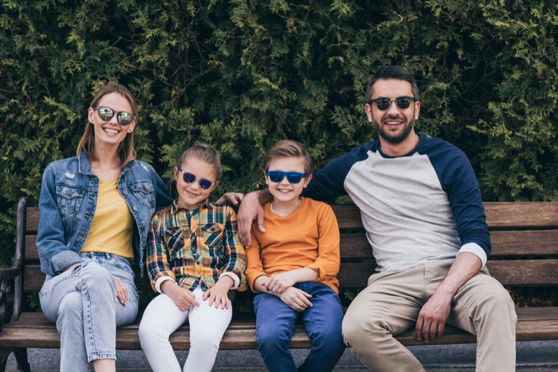 Stylish Family Mom Dad Kids Park Bench