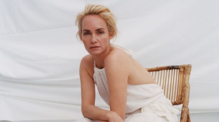 Posing with oranges, Amber Valletta models white dress from Zara