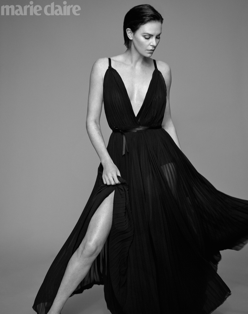 Striking a pose, Charlize Theron wears TRE by Natalie Ratabesi dress