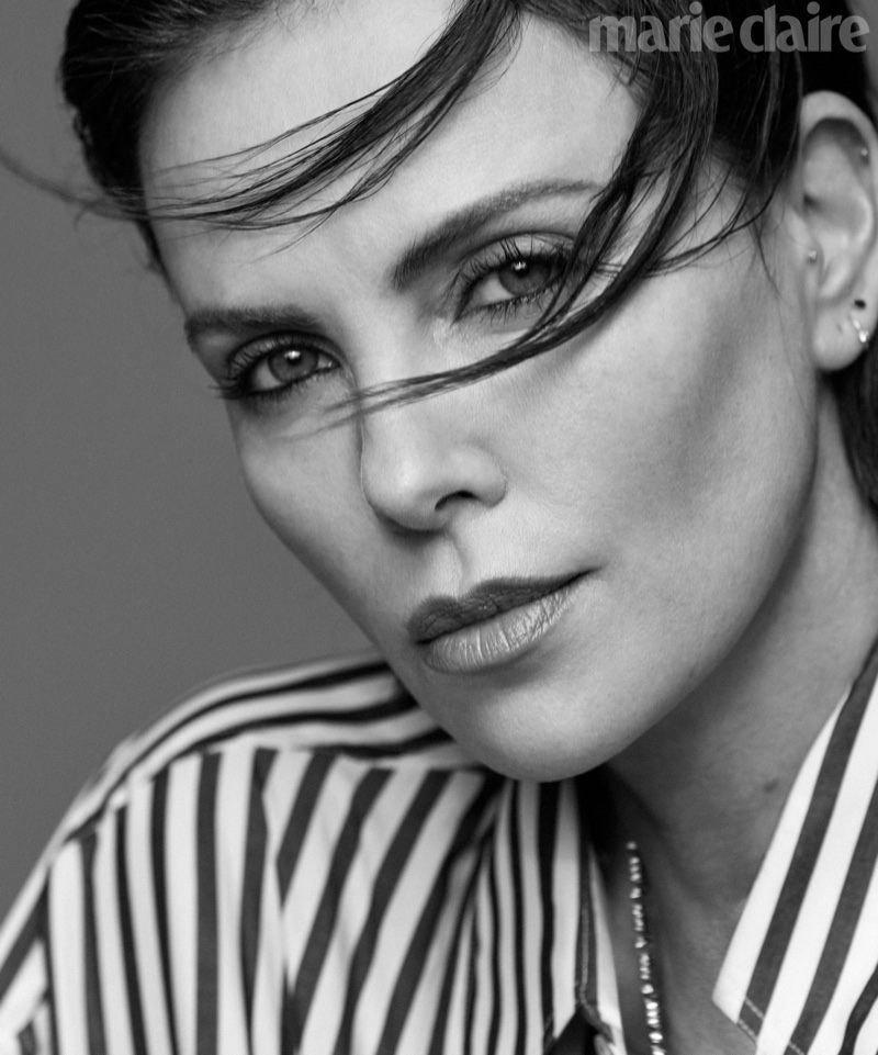 Ready for her closeup, Charlize Theron wears Marc Jacobs top and Cartier necklace