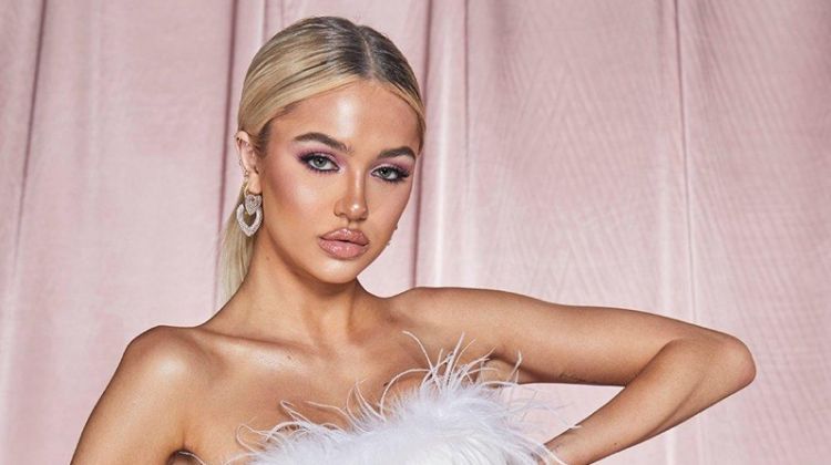 Delilah Belle Hamlin Strikes a Pose in Boohoo's Premium Collection Dressed in feathers, Delilah Belle Hamlin fronts Boohoo Premium Collection campaign