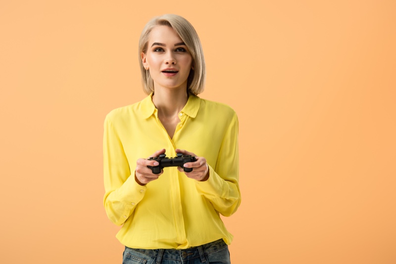 Fashion Model Playing Video Game