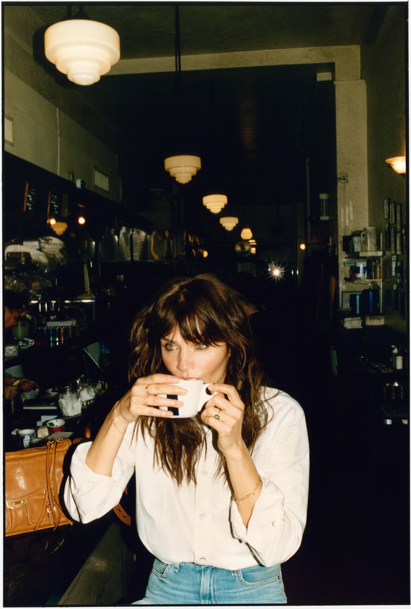 Supermodel Helena Christensen wears Rag & Bone beach shirt and Ruth super high-rise ankle wide leg