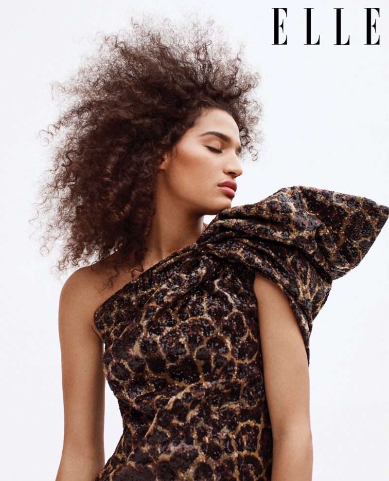 Indya Moore poses in a Saint Laurent dress