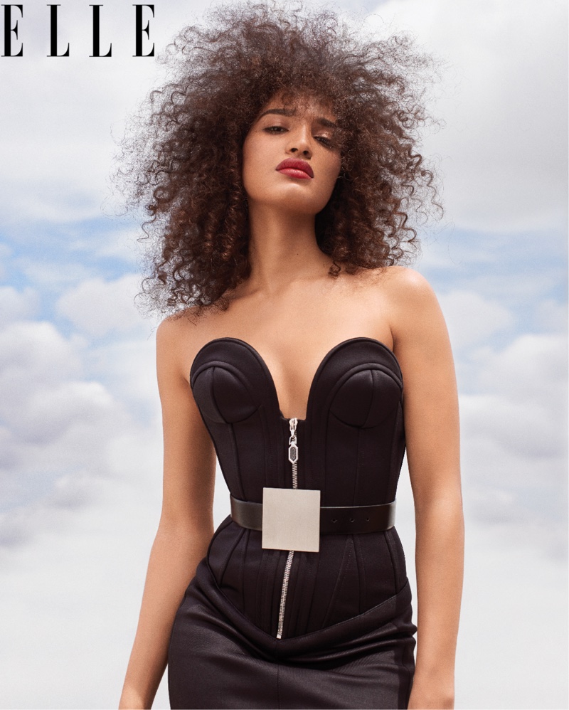 Dressed in black, Indya Moore wears Louis Vuitton dress and belt