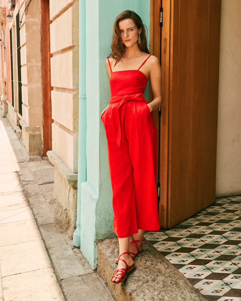 J. Crew Spaghetti-Strap Jumpsuit $128, Bead & Embroidery Earrings $49.50 and Cross-Strap Flat Sandals $78.50