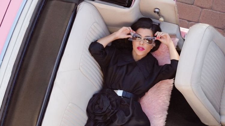 Posing in a convertible, Kourtney Kardashian wears Miu Miu look with Gisueppe Zanotti heels