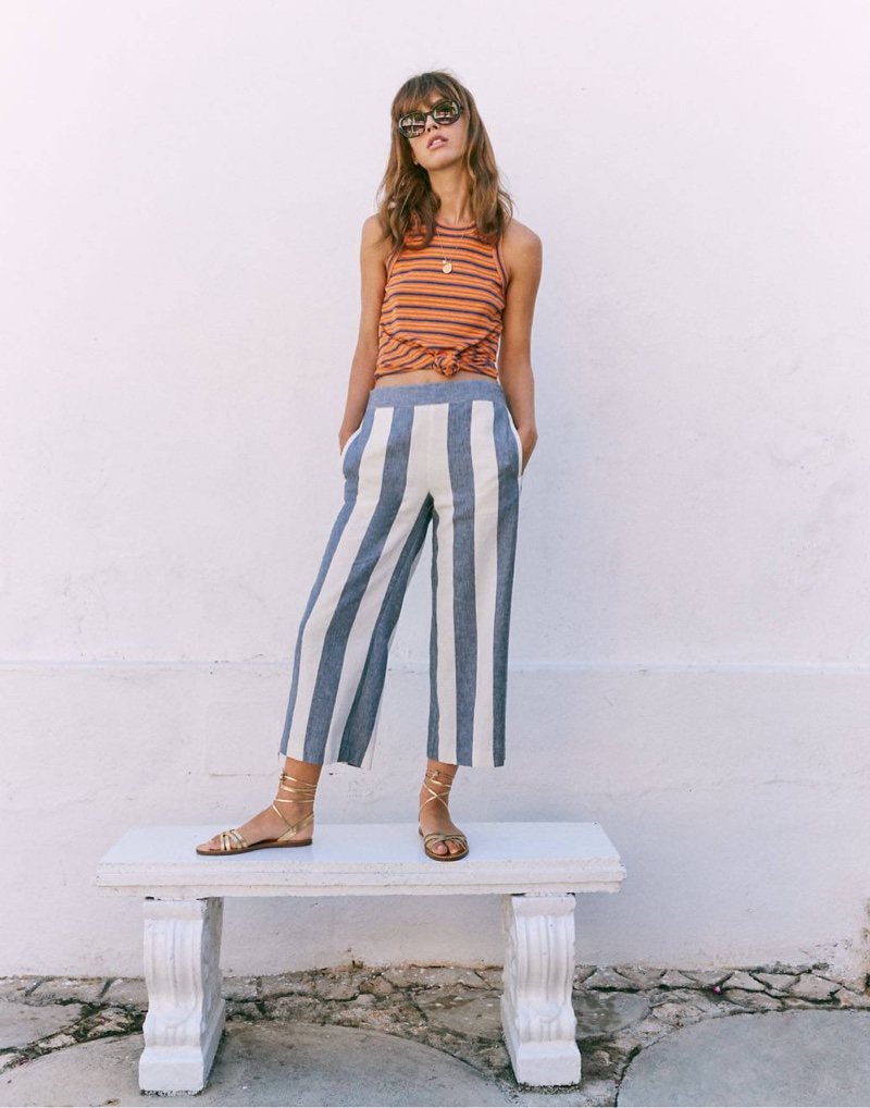 Madewell Audio Knot-Front Tank Top $39.50, Huston Pull-On Crop Pants $69.50 and Griffith Sunglasses $65