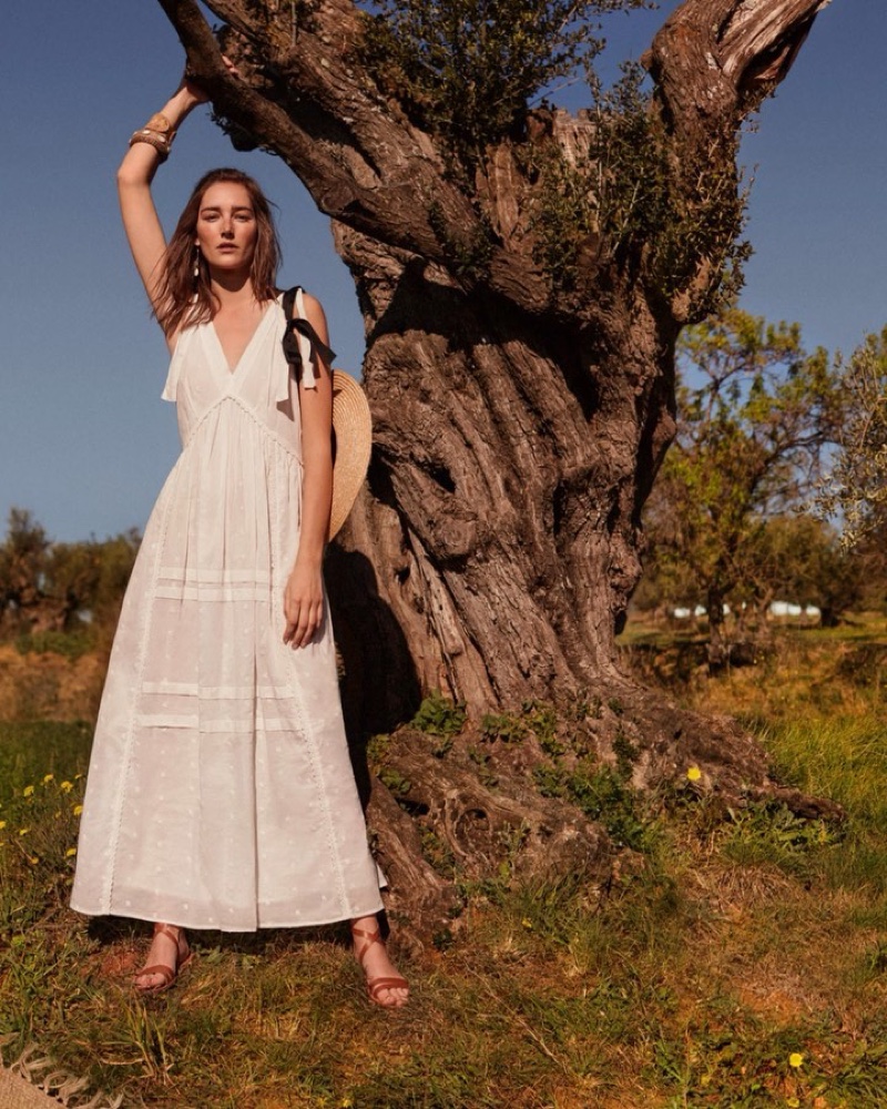 Josephine le Tutour wears white dress from Mango