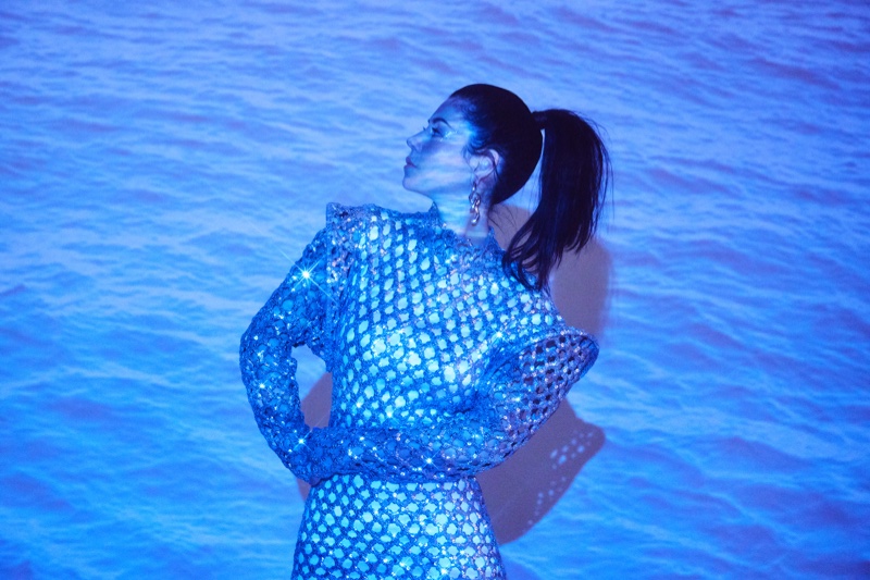 Marina Diamandis poses in a metallic ensemble