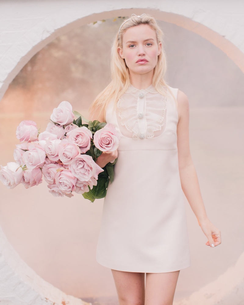 Georgia May Jagger wears Miu Miu lace-trimmed dress from Ceremony capsule collection