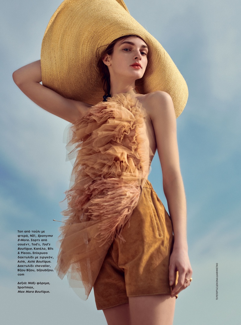 Nastya Abramova Wears Glam Beach Looks for ELLE Greece