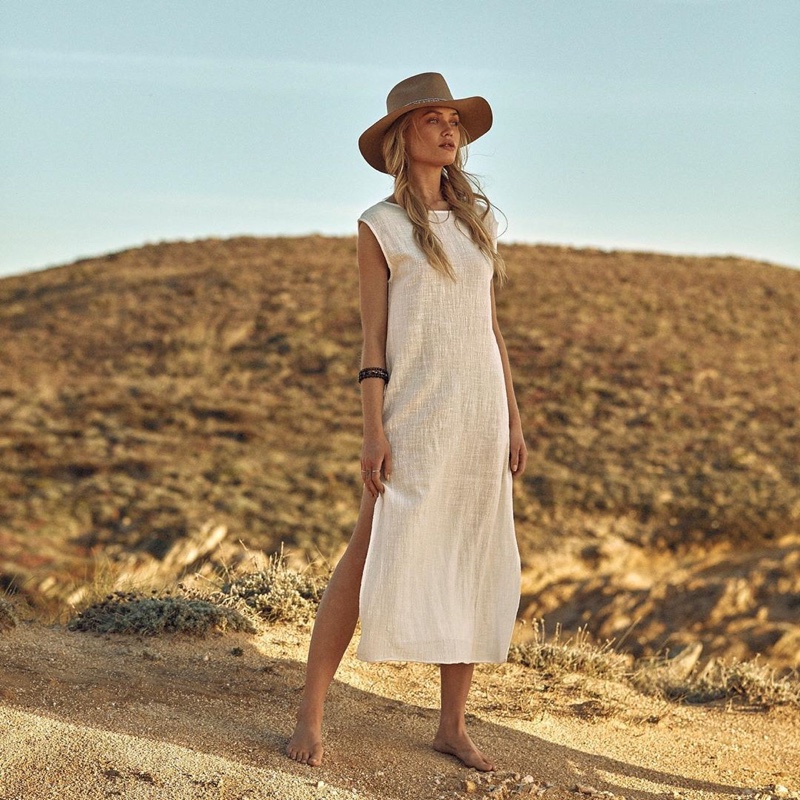 Camilla Christensen wears white coverup from Latitid summer 2019 collection