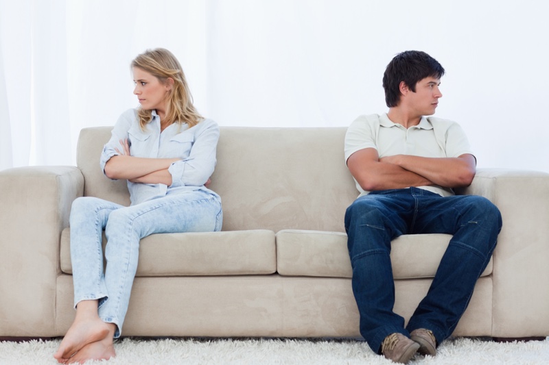 Couple Separate Unhappy Couch