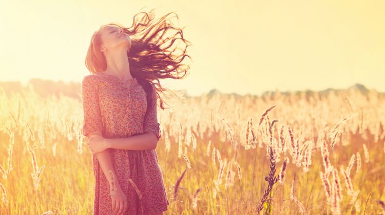 Model Outside in Field Wearing Dress