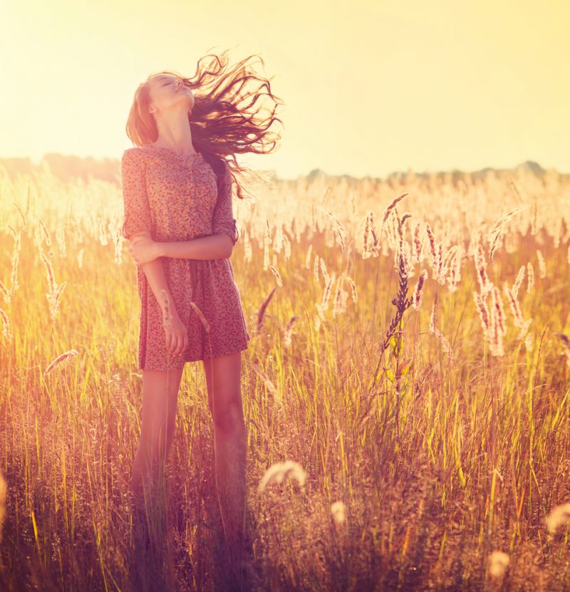 Model Outside in Field Wearing Dress