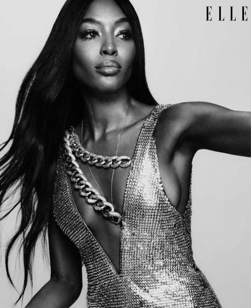 Turning up the shine factor, Naomi Campbell wears Tom Ford dress