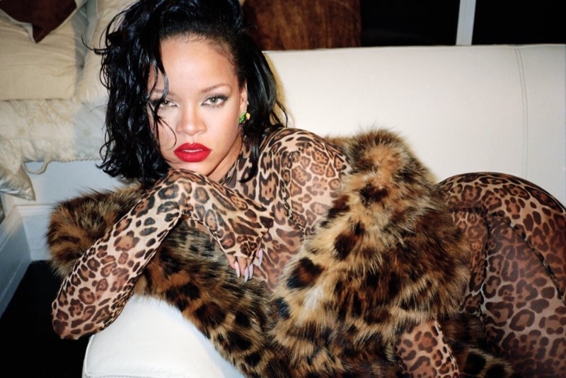 Rihanna wears Laquan Smith catsuit with Dior earrings and Saint Laurent stole