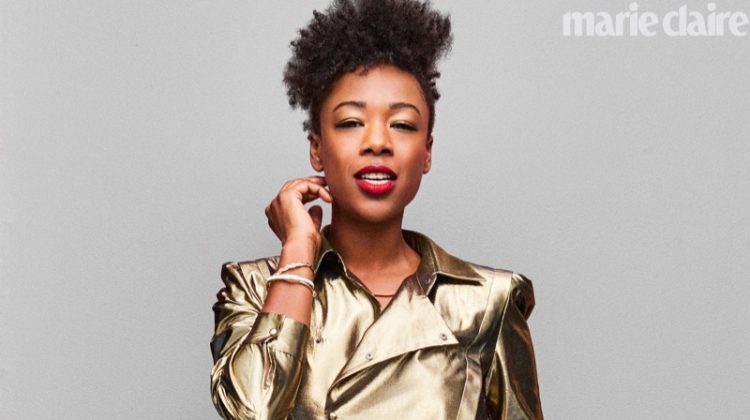 Shining in gold, Samira Wiley wears Saint Laurent top, belt and denim shorts