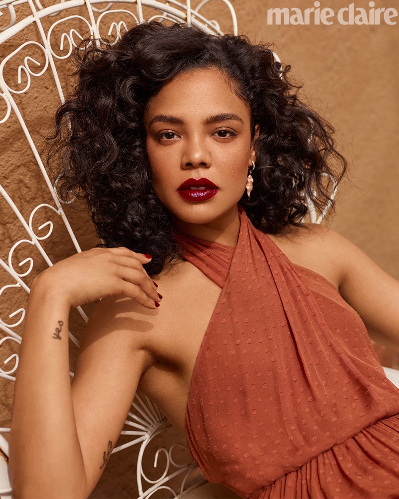 Tessa Thompson poses in Kate Spade New York dress and Simon G. Jewelry earrings