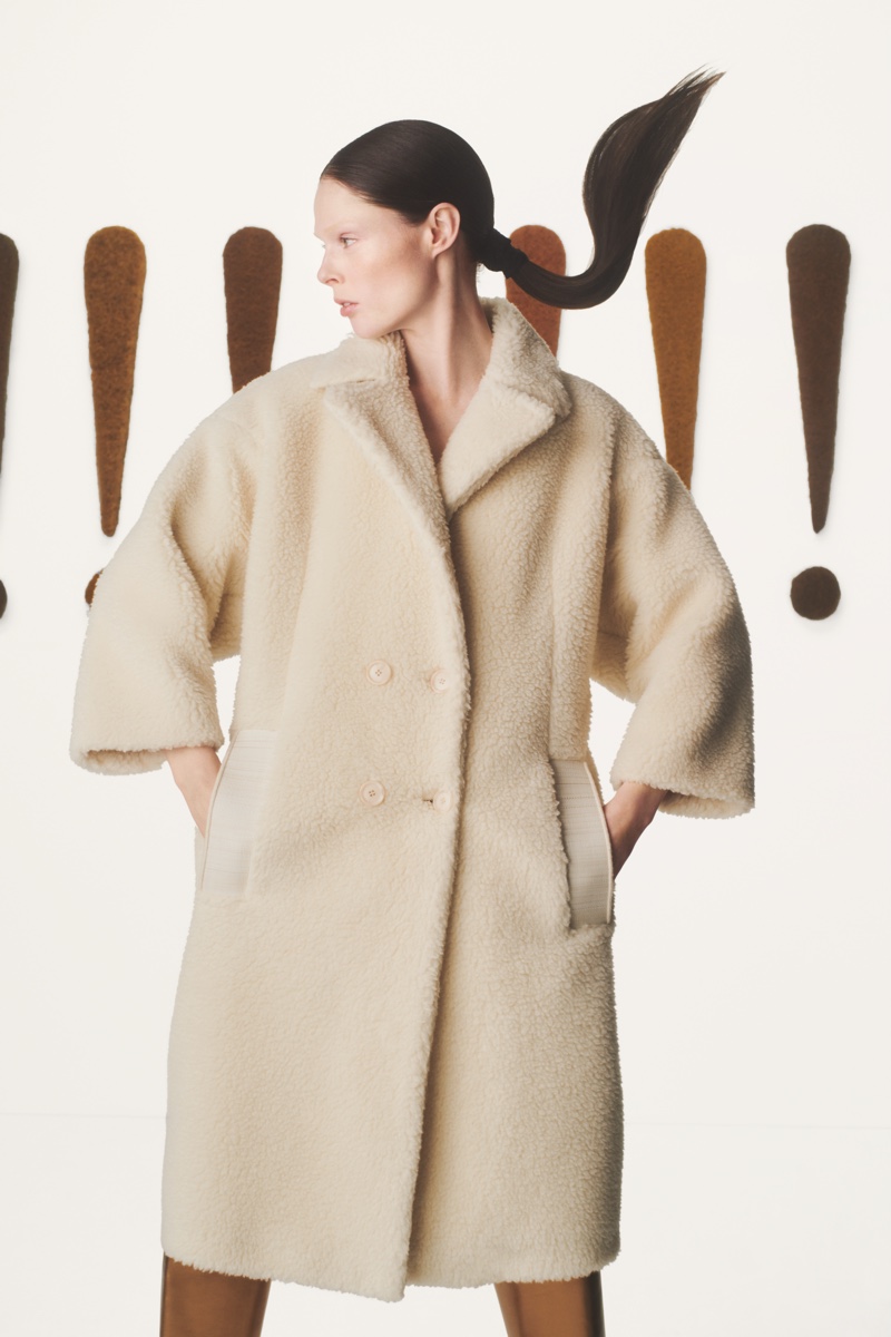 Model Coco Rocha wears chic outerwear for Akris fall-winter 2019 campaign