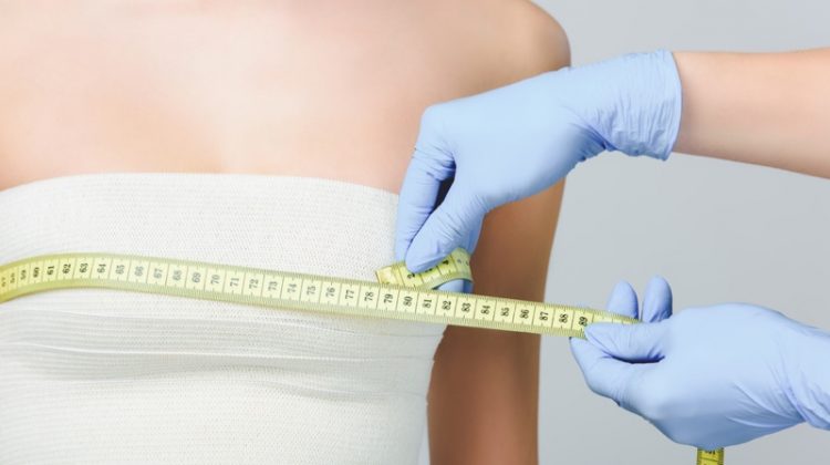 What You Need to Know to Prepare for Breast Augmentation Surgery Breast Measuring Patient Gloves