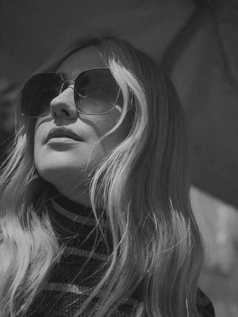 Getting her closeup, Dakota Fanning wears Ulla Johnson sweater with Gucci sunglasses