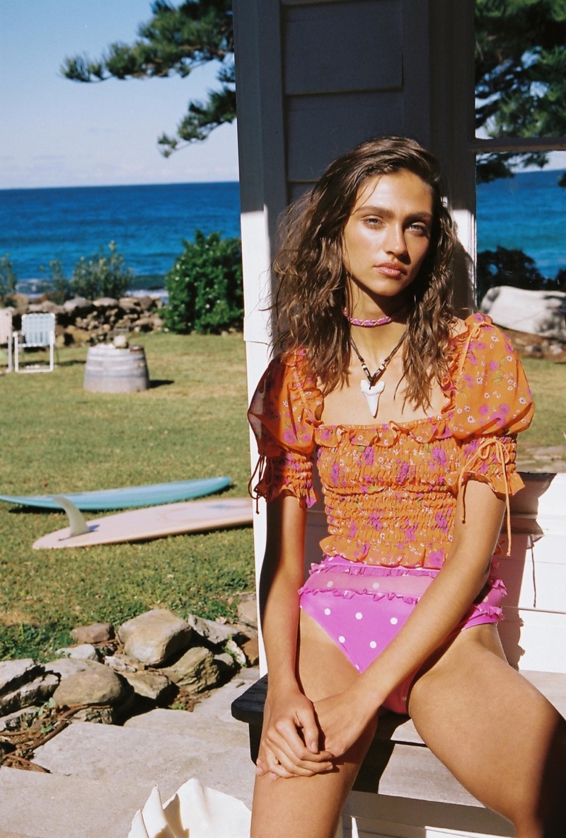 Krini Alejandra wears For Love & Lemons Peony smocked top and Tutti Frutti hi waist bottoms