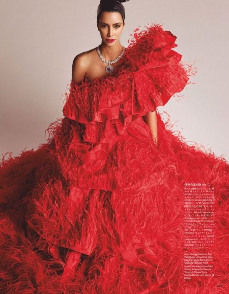 Kim Kardashian Poses in Avant-Garde Designs for Vogue Japan Dressed in red, Kim Kardashian wears Valentino Haute Couture gown