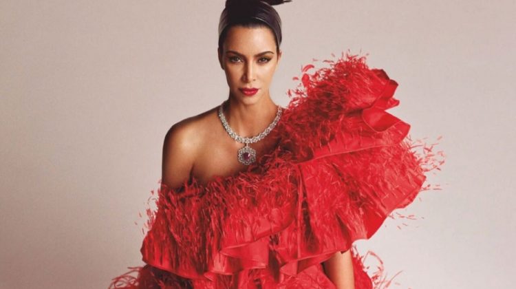 Dressed in red, Kim Kardashian wears Valentino Haute Couture gown