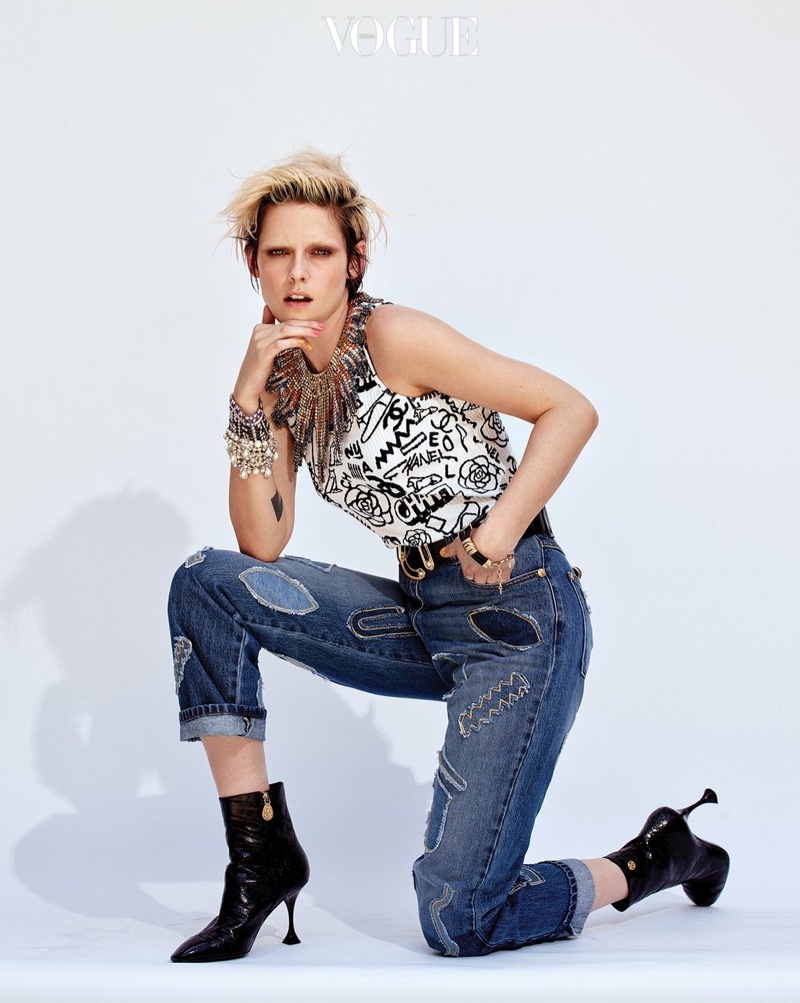 Posing in a studio, Kristen Stewart wears Chanel outfit