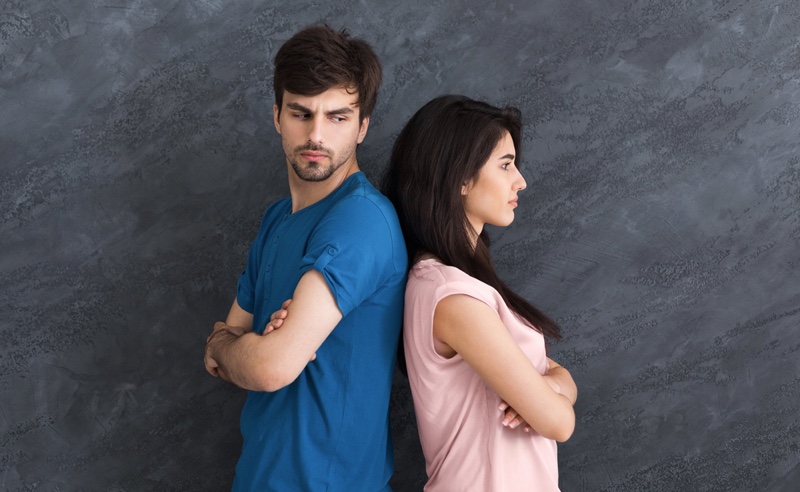 Man Woman Couple Conflict Posing Backs Turned