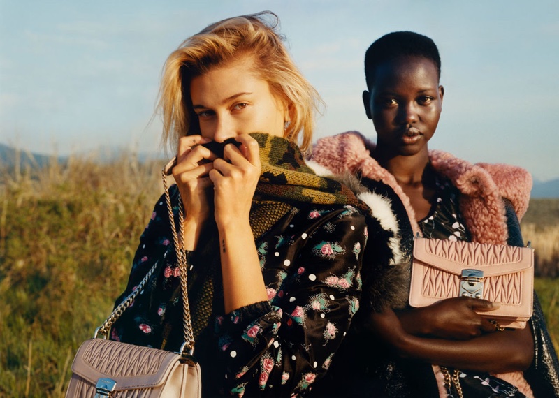 Models Hailey Baldwin and Adut Akech front Miu Miu fall-winter 2019 campaign