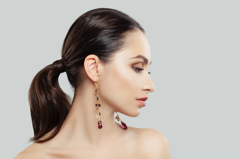 Model Garnet Earrings Ponytail Brunette