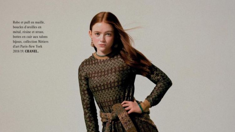 Striking a pose, Sadie Sink wears Chanel dress, sweater and boots