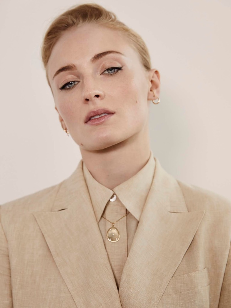 Actress Sophie Turner wears Theory blazer and shirt