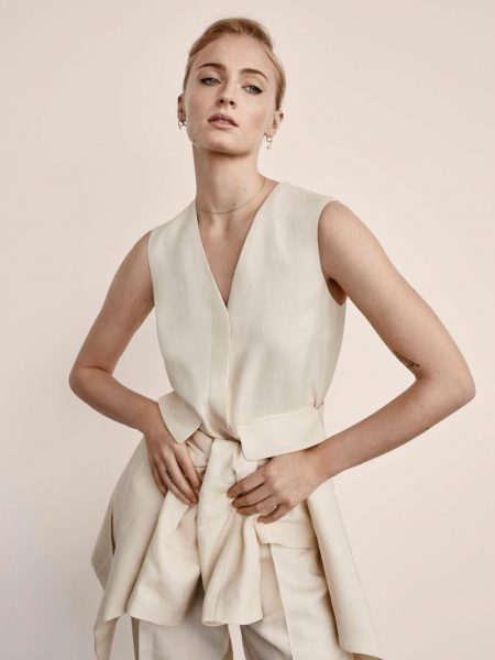 Sophie Turner Poses in Neutral Hues for PORTER Edit Striking a pose, Sophie turner wears Blazer, top and pants from Victoria, Victoria Beckham