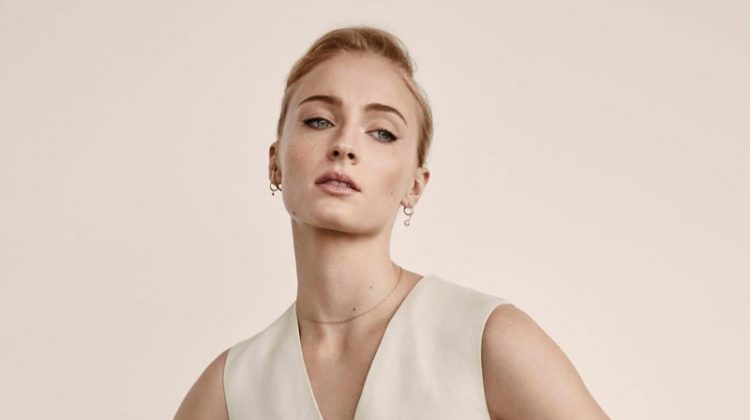 Striking a pose, Sophie turner wears Blazer, top and pants from Victoria, Victoria Beckham