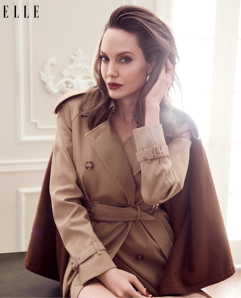 Angelina Jolie wears Burberry trench coat with Rosantica earrings