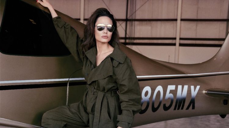Angelina Jolie poses in Stella McCartney jumpsuit with Dolce & Gabbana sunglasses