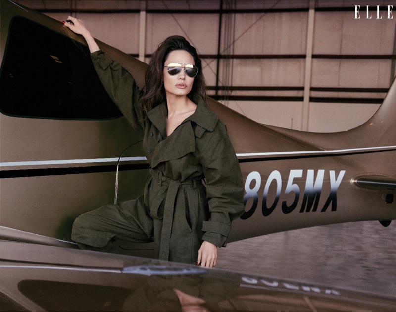 Angelina Jolie poses in Stella McCartney jumpsuit with Dolce & Gabbana sunglasses