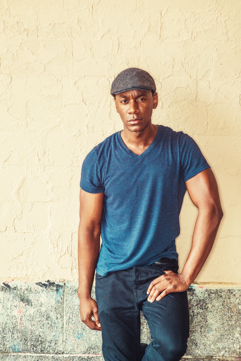 Black Man V-Neck Shirt Jeans Newspaper Boy Cap