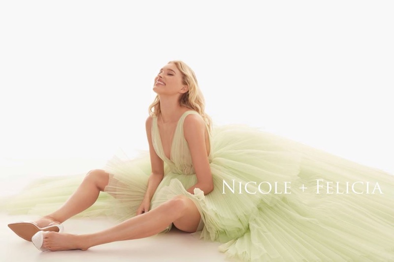 Model Elsa Hosk poses in green dress for Nicole + Felicia Couture fall-winter 2019 campaign