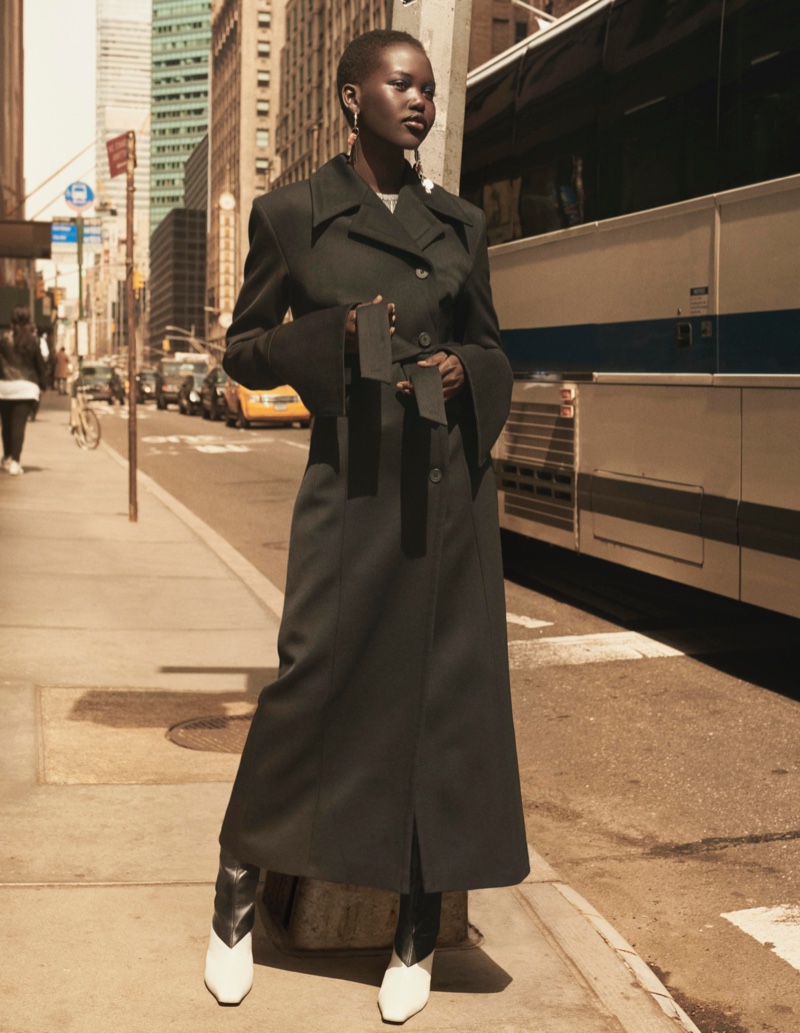 Adut Akech poses in belted coat for H&M Studio fall-winter 2019 campaign