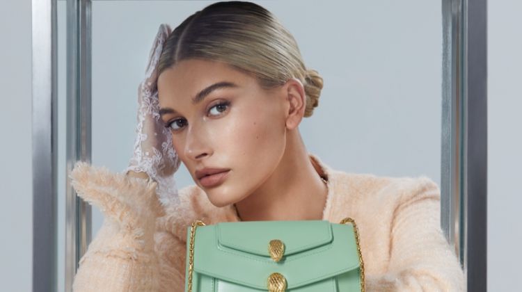Model Hailey Baldwin poses with Serpenti Forever bag from Alexander Wang x Bulgari campaign