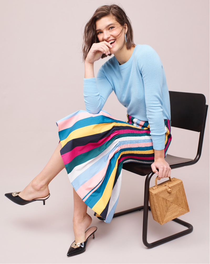 J. Crew Long-Sleeve Everyday Cashmere Crewneck Sweater $98, Smocked Skirt in Rainbow Stripe $148, Sophia Kitten Heels $178 and Bembien Stella Bag $185