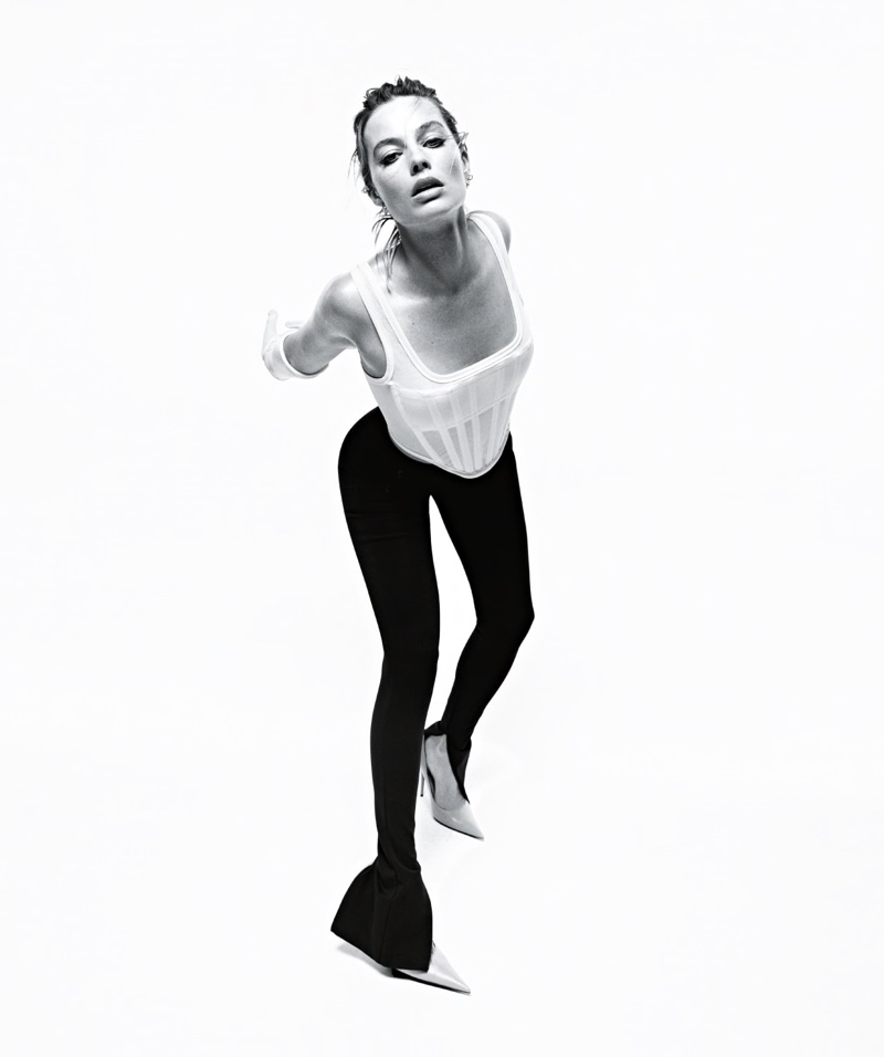 Margot Robbie wears Dion Lee top with WARDROBE.NYC pants